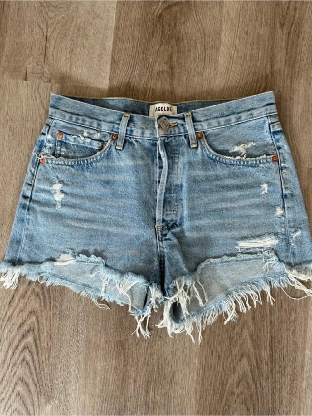 Agolde Washed Light Blue Distressed Cutoff Shorts